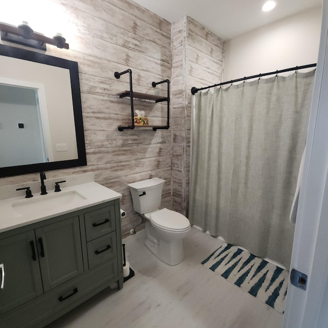 2238 Rolling Green Trl, North Mankato, MN 56003 - bathroom with vanity, a shower with curtain, and tile walls