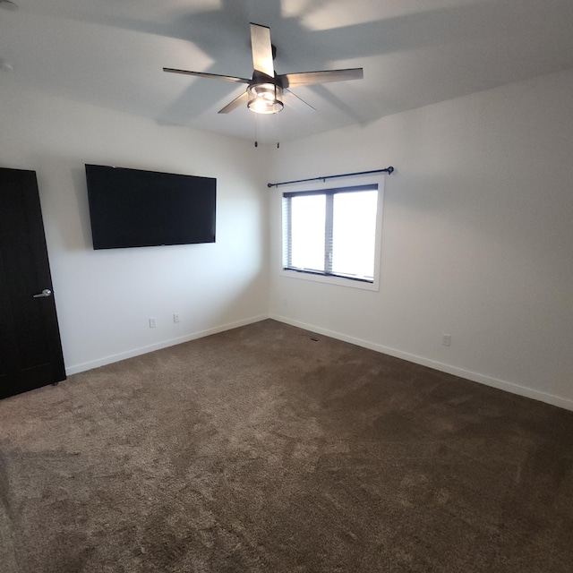 2238 Rolling Green Trl, North Mankato, MN 56003 - spare room with dark carpet and a ceiling fan