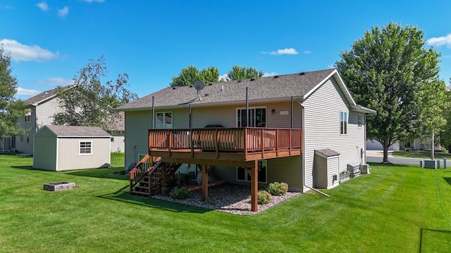 1057 John And Mary Dr SE, Chatfield, MN 55923 - back of house featuring a deck, stairway, a yard, a storage shed, and a shingled roof