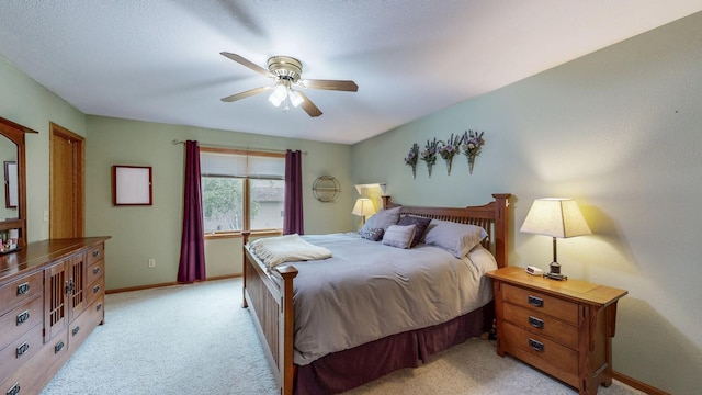 1057 John And Mary Dr SE, Chatfield, MN 55923 - bedroom with light carpet and a ceiling fan