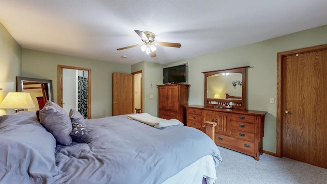 1057 John And Mary Dr SE, Chatfield, MN 55923 - bedroom with light colored carpet and a ceiling fan