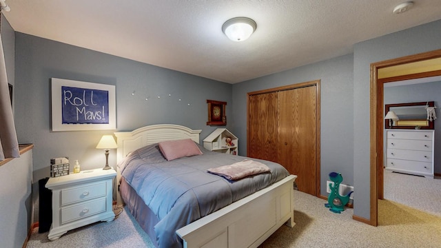 1057 John And Mary Dr SE, Chatfield, MN 55923 - carpeted bedroom featuring a closet and baseboards