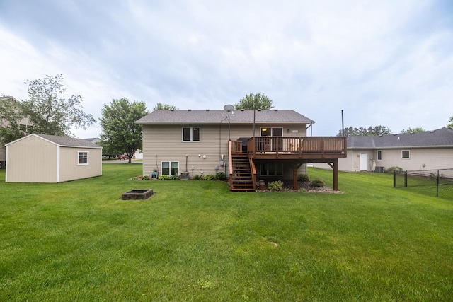 1057 John And Mary Dr SE, Chatfield, MN 55923 - back of house featuring stairs, a deck, a fire pit, and an outdoor structure