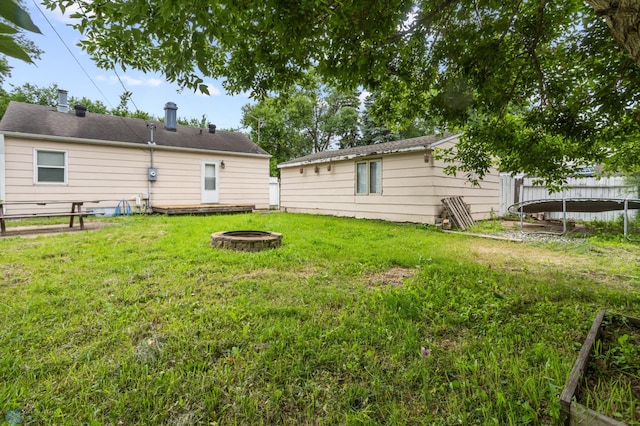 1709 13th Ave S, Fargo, ND 58103 - view of yard with an outdoor fire pit and a trampoline