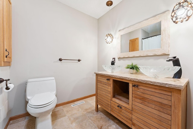 5401 River Oak Dr, Savage, MN 55378 - bathroom featuring vanity and baseboards