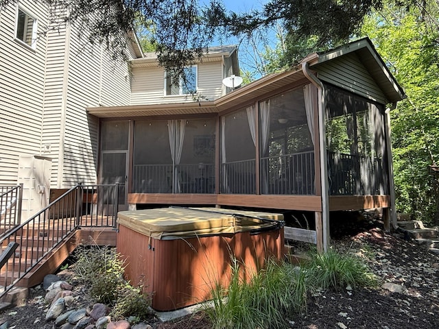 5401 River Oak Dr, Savage, MN 55378 - rear view of house featuring a sunroom and a hot tub