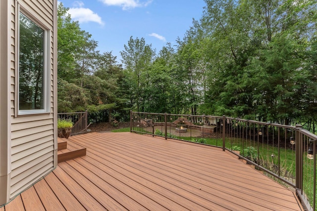 5401 River Oak Dr, Savage, MN 55378 - wooden deck featuring view of wooded area