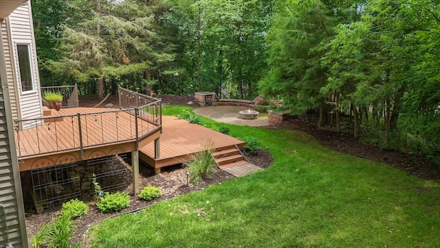 5401 River Oak Dr, Savage, MN 55378 - view of grassy yard featuring a fire pit and a deck