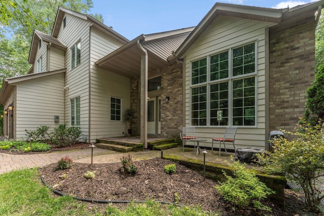 5401 River Oak Dr, Savage, MN 55378 - back of property with brick siding