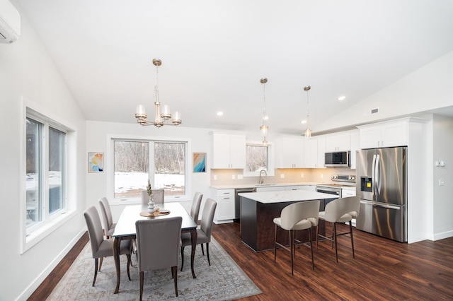 3829 Stebner Rd, Hermantown, MN 55811 - dining space featuring vaulted ceiling, dark wood-style floors, a chandelier, recessed lighting, and a wall mounted AC