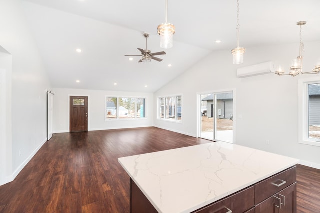3829 Stebner Rd, Hermantown, MN 55811 - kitchen featuring a wall mounted AC, vaulted ceiling, dark wood-style floors, a chandelier, and ceiling fan