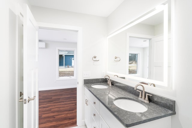 3829 Stebner Rd, Hermantown, MN 55811 - full bathroom with double vanity and wood finished floors