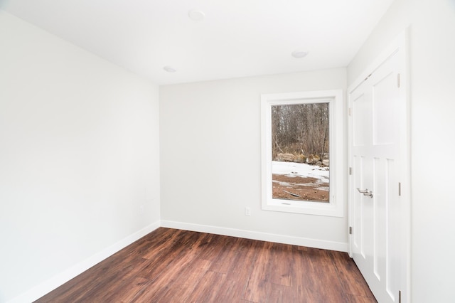 3829 Stebner Rd, Hermantown, MN 55811 - unfurnished room featuring dark wood-type flooring and baseboards
