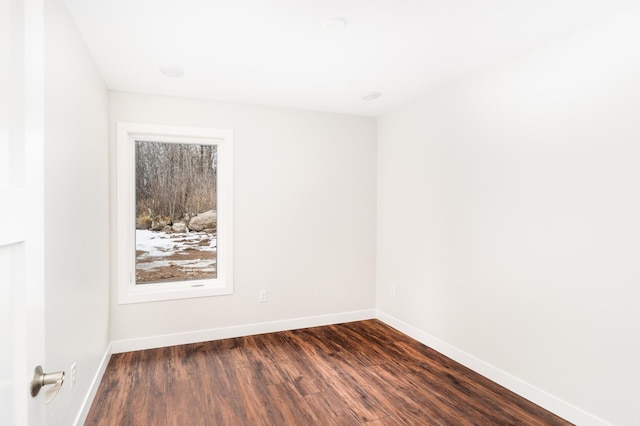 3829 Stebner Rd, Hermantown, MN 55811 - empty room with dark wood finished floors and baseboards