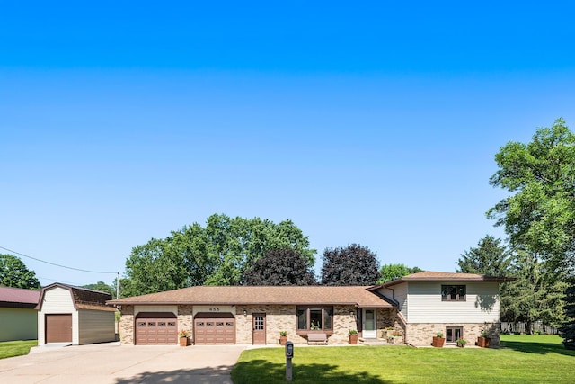 655 48th Ave, Goodview, MN 55987 - tri-level home featuring concrete driveway, a front yard, and an attached garage