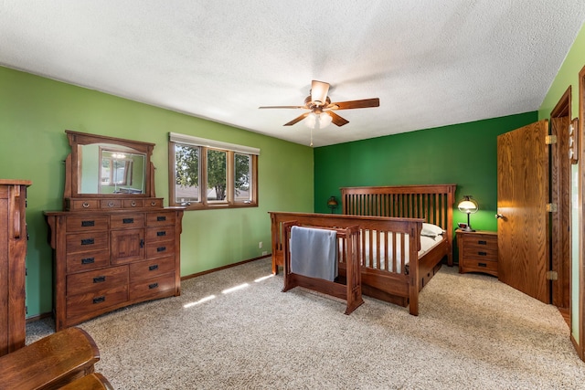 655 48th Ave, Goodview, MN 55987 - bedroom with carpet floors, a textured ceiling, and a ceiling fan