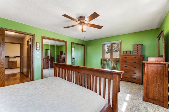 655 48th Ave, Goodview, MN 55987 - bedroom with two closets and a ceiling fan