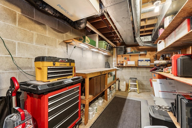655 48th Ave, Goodview, MN 55987 - unfinished basement featuring a workshop area and concrete block wall