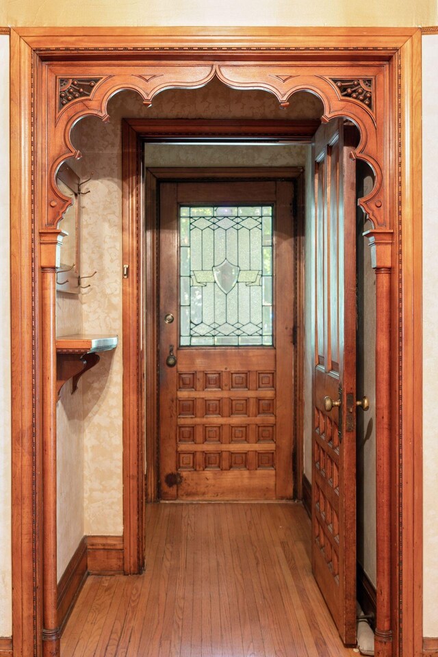 1323 Keston St, Saint Paul, MN 55108 - doorway featuring hardwood / wood-style flooring and baseboards
