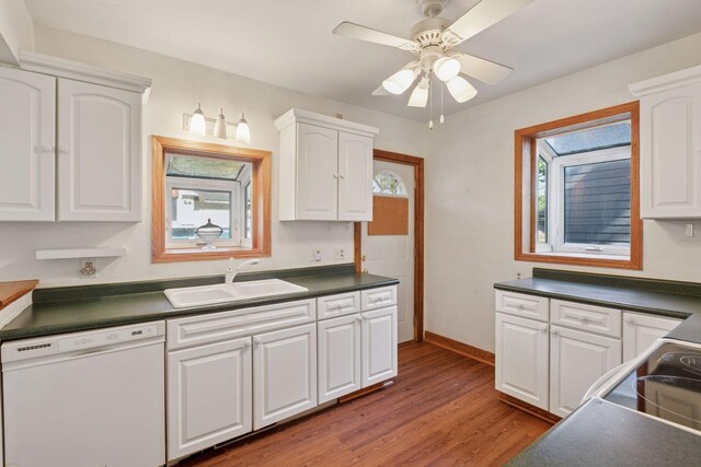 1323 Keston St, Saint Paul, MN 55108 - kitchen featuring dishwasher, dark countertops, white cabinetry, wood finished floors, and a ceiling fan