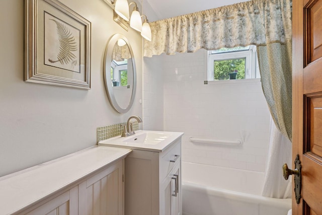 1323 Keston St, Saint Paul, MN 55108 - bathroom with vanity and shower / bath combo with shower curtain