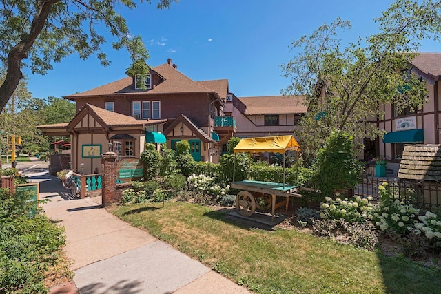1323 Keston St, Saint Paul, MN 55108 - view of property's community featuring a lawn