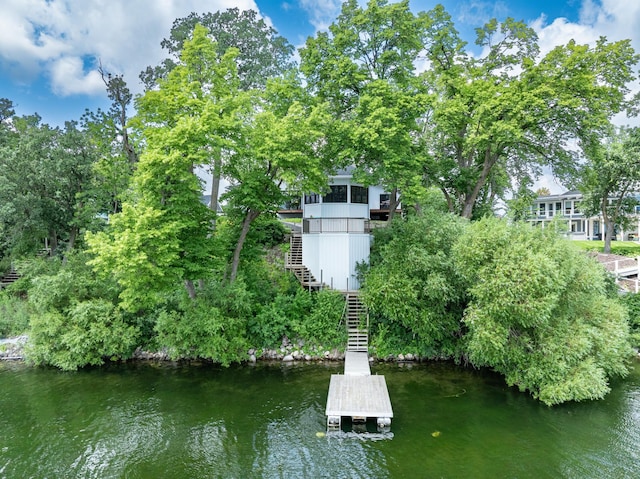 4255 County Road 11 NE, Alexandria, MN 56308 - dock area with stairs, a water view, and view of scattered trees