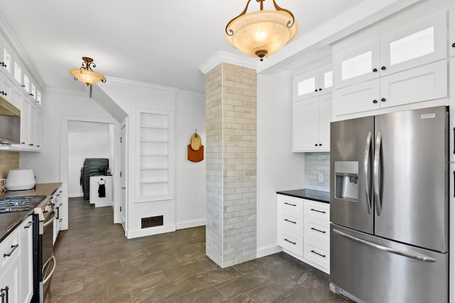 4255 County Road 11 NE, Alexandria, MN 56308 - kitchen with stainless steel appliances, dark countertops, ornate columns, ornamental molding, and tasteful backsplash