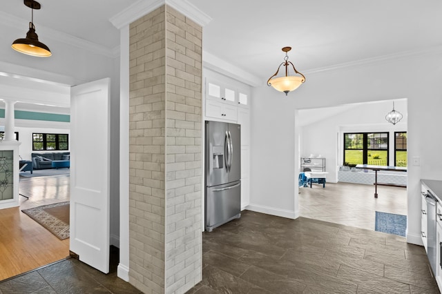 4255 County Road 11 NE, Alexandria, MN 56308 - kitchen with stainless steel fridge, ornate columns, white cabinetry, glass insert cabinets, and ornamental molding
