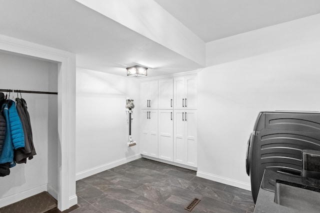 4255 County Road 11 NE, Alexandria, MN 56308 - mudroom with washer / clothes dryer and baseboards