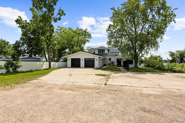 4255 County Road 11 NE, Alexandria, MN 56308 - modern farmhouse style home featuring an attached garage, concrete driveway, and solar panels