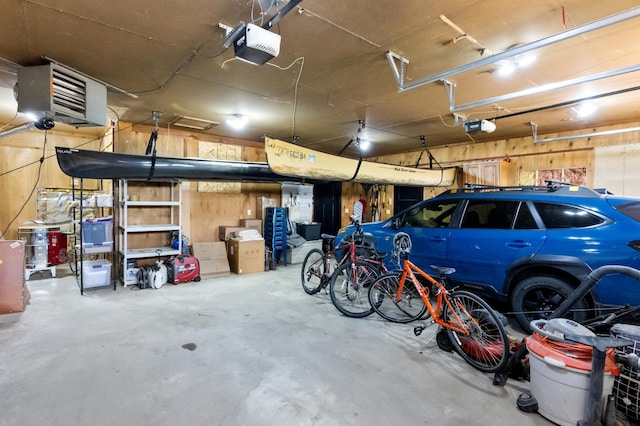 4255 County Road 11 NE, Alexandria, MN 56308 - garage featuring a garage door opener and a heating unit
