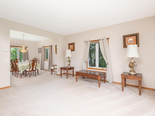 1632 Seashell Ln, Waconia, MN 55387 - sitting room featuring light colored carpet and a chandelier