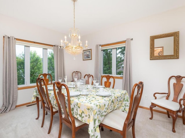 1632 Seashell Ln, Waconia, MN 55387 - dining space with a chandelier and light colored carpet