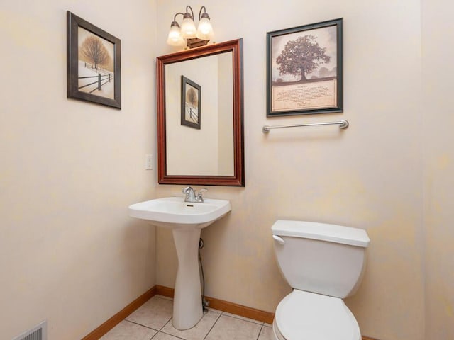1632 Seashell Ln, Waconia, MN 55387 - bathroom with baseboards and tile patterned floors