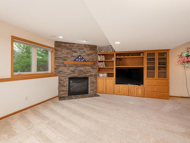 1632 Seashell Ln, Waconia, MN 55387 - unfurnished living room featuring light colored carpet, a fireplace, and recessed lighting