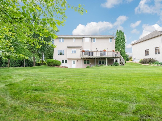 1632 Seashell Ln, Waconia, MN 55387 - back of property featuring stairs, a wooden deck, and a yard