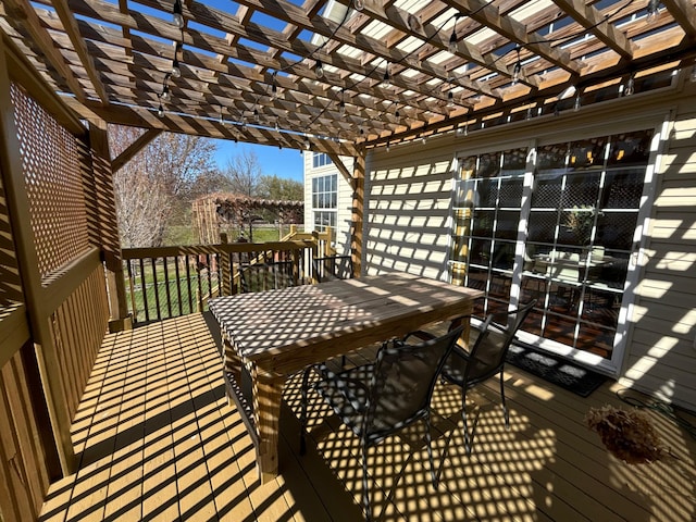 23120 Gardner Ave, Rogers, MN 55374 - wooden terrace featuring outdoor dining space and a pergola