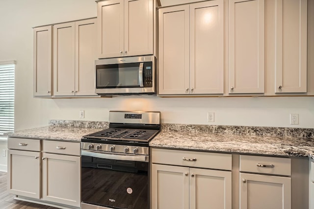 1221 136th St W, Rosemount, MN 55068 - kitchen with appliances with stainless steel finishes and light stone countertops