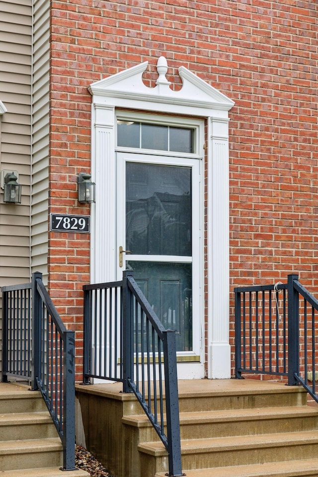 7829 Elm Grove Ln, New Hope, MN 55428 - doorway to property with brick siding