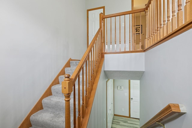 7829 Elm Grove Ln, New Hope, MN 55428 - stairs featuring wood finished floors