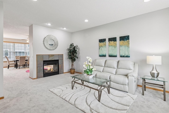 7829 Elm Grove Ln, New Hope, MN 55428 - living room featuring carpet, recessed lighting, ceiling fan, and a tile fireplace