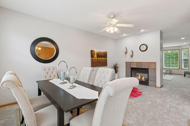 7829 Elm Grove Ln, New Hope, MN 55428 - dining space with carpet flooring, recessed lighting, ceiling fan, and a tiled fireplace