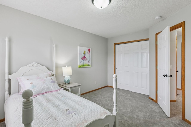 7829 Elm Grove Ln, New Hope, MN 55428 - bedroom with carpet flooring, a textured ceiling, and a closet
