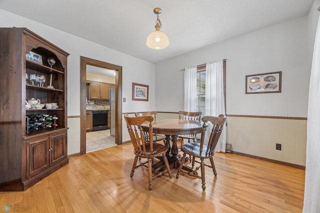 1330 12th St N, Fargo, ND 58102 - dining space with light wood-style flooring