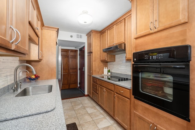 6615 Lake Shore Dr S Unit 803, Richfield, MN 55423 - kitchen with black appliances, decorative backsplash, and light countertops