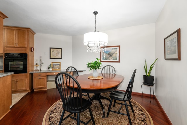 6615 Lake Shore Dr S Unit 803, Richfield, MN 55423 - dining room with dark wood-style floors and a chandelier