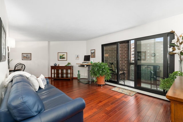 6615 Lake Shore Dr S Unit 803, Richfield, MN 55423 - living area with wood finished floors and a baseboard radiator