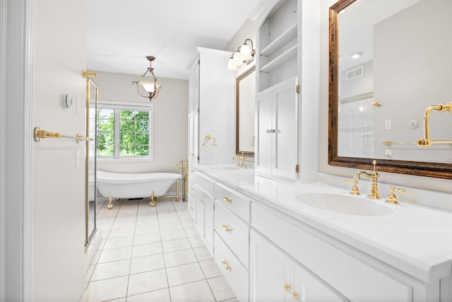 1215 Shore Dr SW, Hutchinson, MN 55350 - bathroom featuring double vanity, tile patterned floors, and a soaking tub