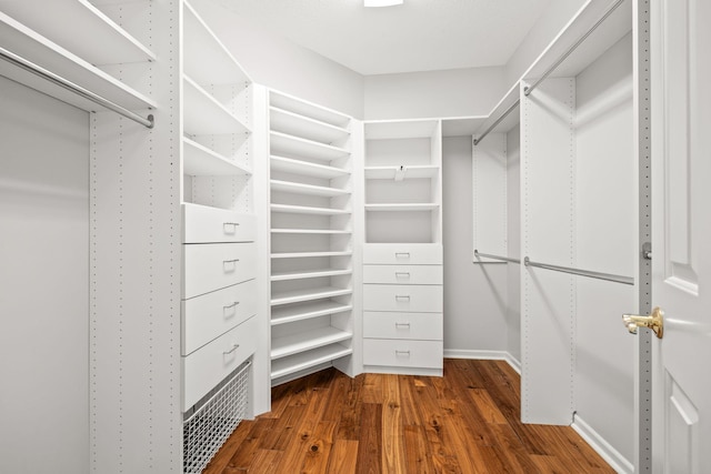 1215 Shore Dr SW, Hutchinson, MN 55350 - walk in closet with wood finished floors